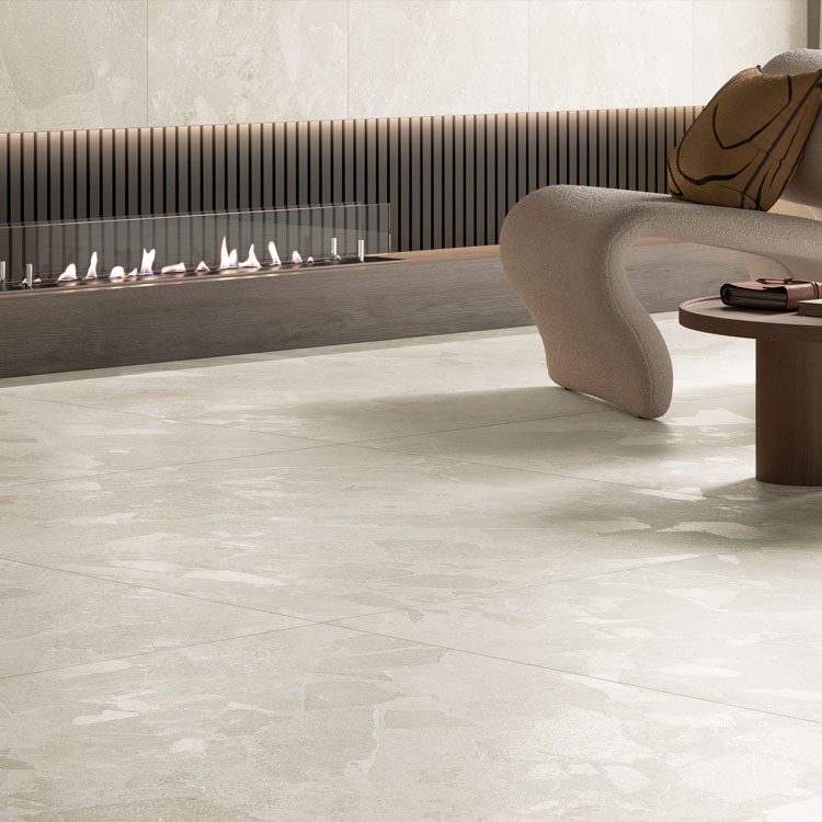 white ceppo di gre stone tile by living room and fireplace with modern furniture