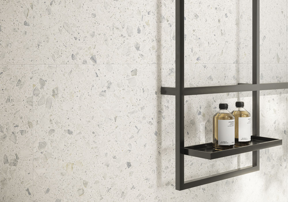 white and gray and blue terrazzo on a bathroom wall