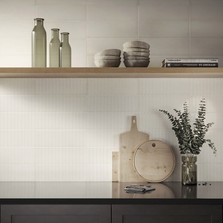 slightly textured white kitchen backsplash with minimal grout lines