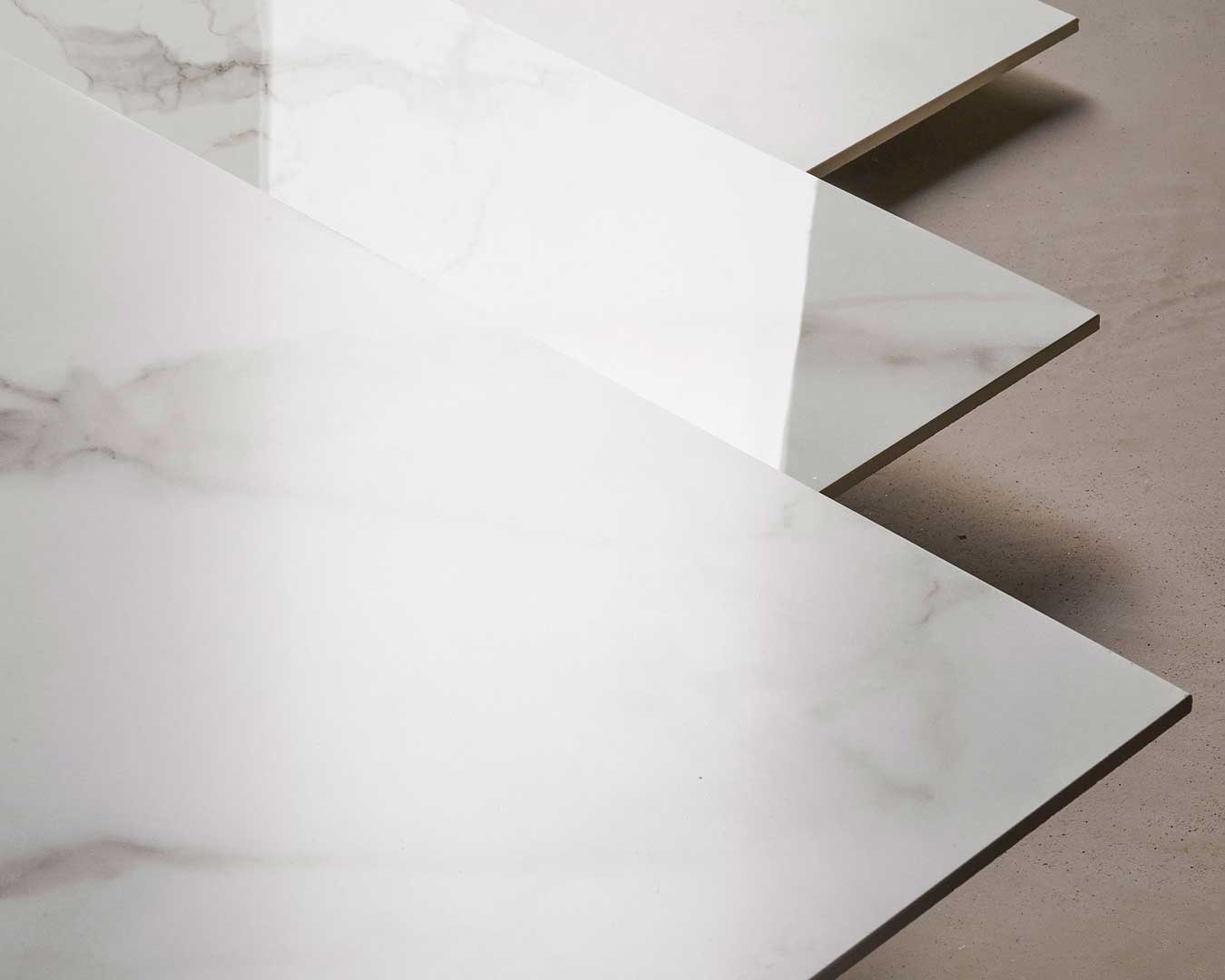 Close-up view of Versaille White marble-look porcelain tiles in smooth and polished finishes
