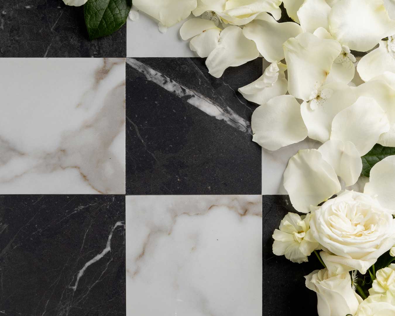 Versaille porcelain tile in a bold grey and silver checkerboard pattern.