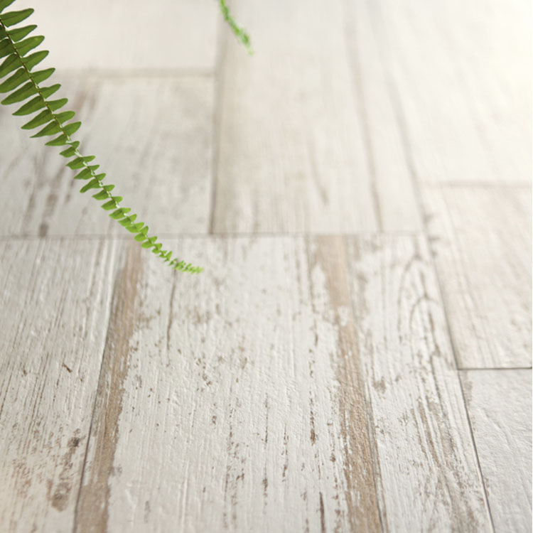 white wood look porcelain plank flooring with rustic details